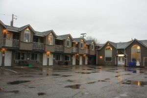 Parking lot and main building at The Monashee Lodge in Revelstoke